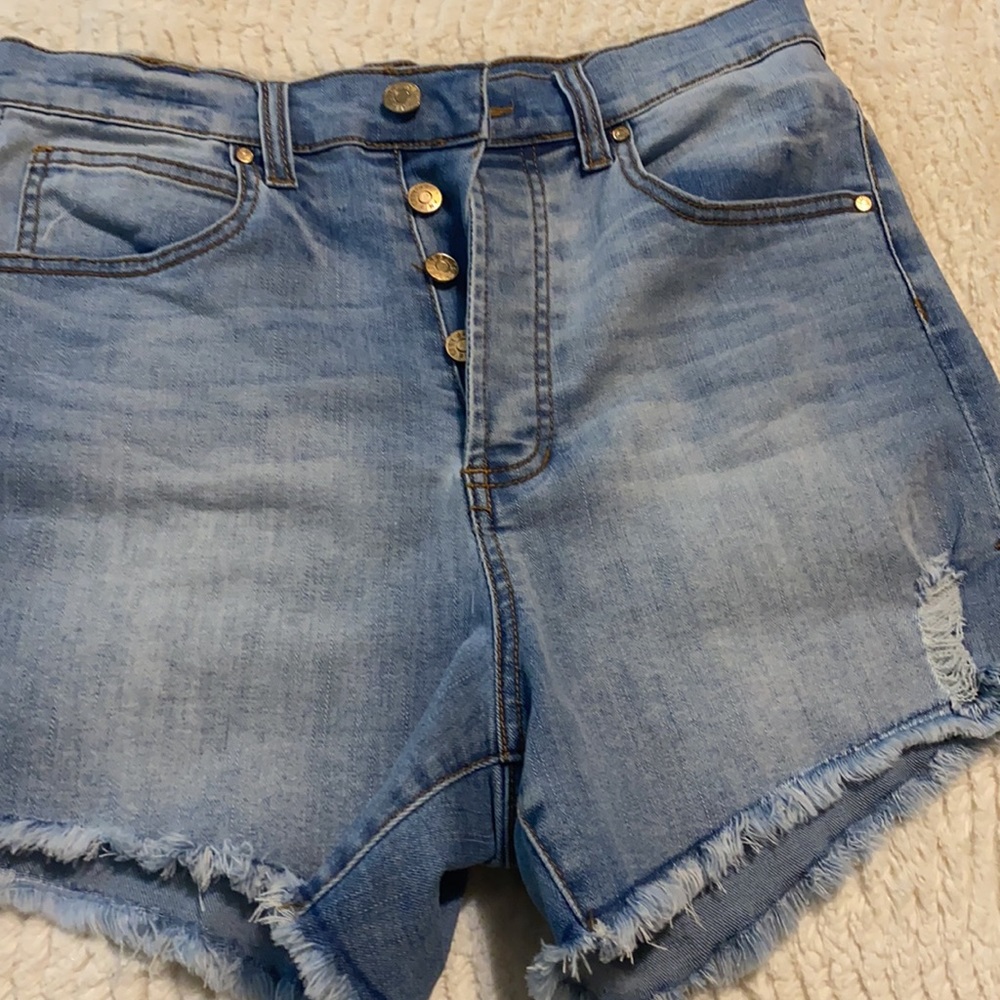 Denim button fly pair of shorts